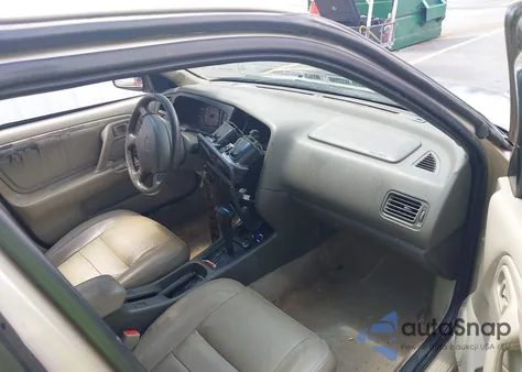 1999 Infiniti G20 Standard/Touring из США, поврежденный, VIN JNKCP11A5XT003361